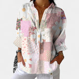 Nika – Poletna bluzica z živahnim potiskom